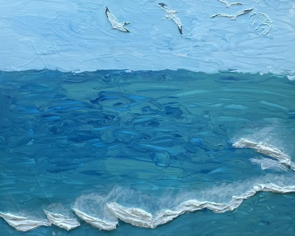 An impressionist painting of a seascape, featuring swirling blues and greens to represent the ocean's depths and movement. Textured white waves crash onto an unseen shore, while the sky above is light blue with wispy clouds. Three birds are mid-flight, enhancing the painting's dynamic yet tranquil atmosphere. The visible brushstrokes add rich texture and energy to the artwork.