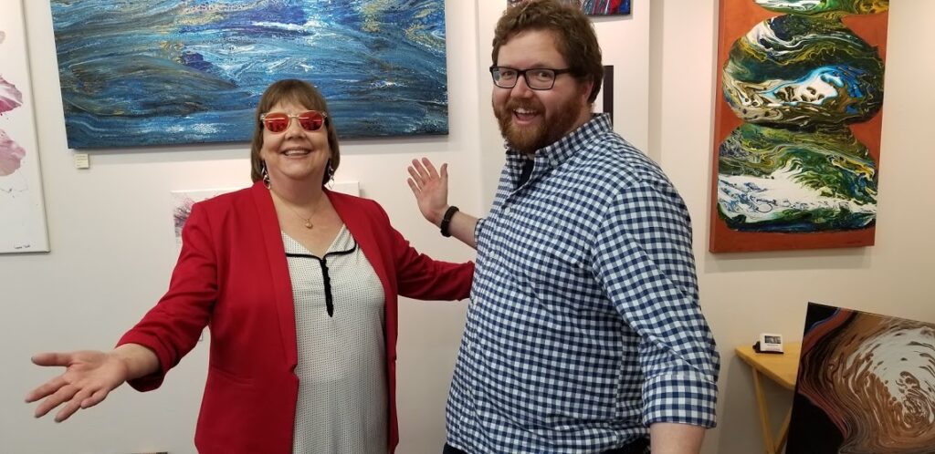 Alex Smyth, AMI host and Lynda Todd at her solo exhibit at Paul's Art Gallery