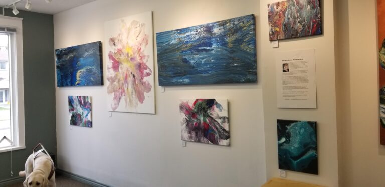 Picture of art on the wall at Paul's Art Gallery.