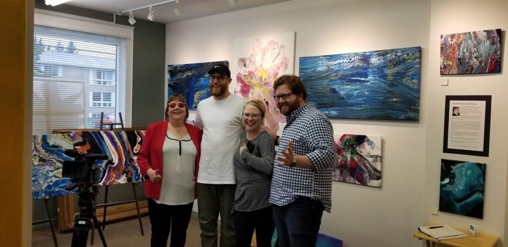 Lynda standing with the AMI crew who interviewed me for my new exhibit.