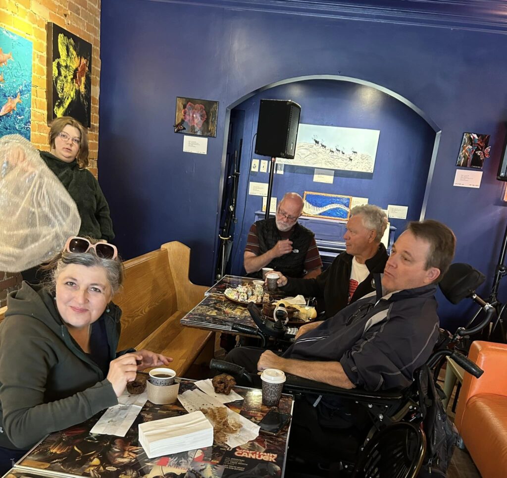 Picture of a group of people at the Artist talk at the Dreams of Beans exhibit.