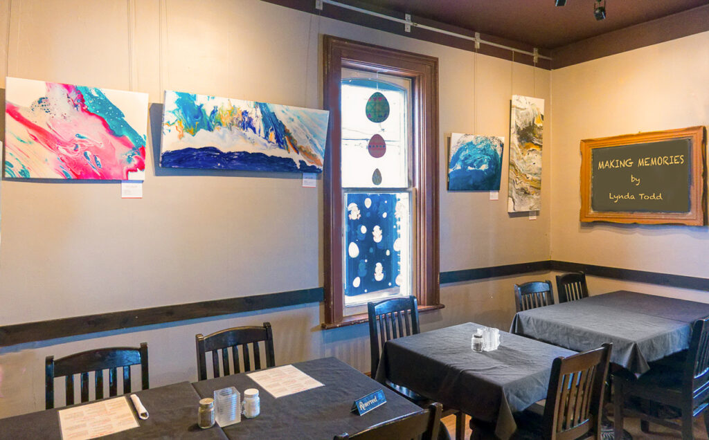 Picture of art at the Caper's Restaurant exhibit. Lynda Todd