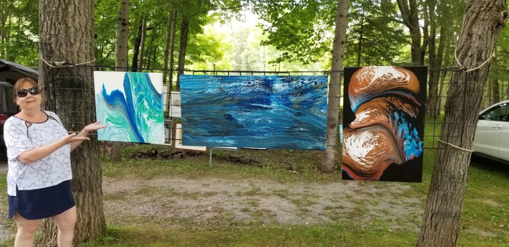 art hanging at the Miskwaa art gallery, Bobcaygeon, outdoor gallery.